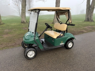 (1) 2017 E-Z-Go golf cart with a Kawasaki gas engine, model 625111G01, includes canopy, ball cover, ...