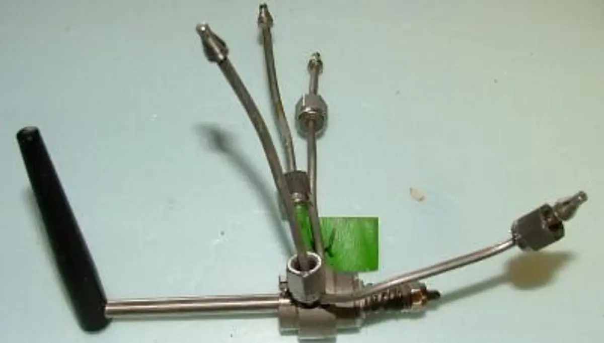 QTY. 1. VICI VALVE 4 PORT WITH FITTINGS AND HANDLE...