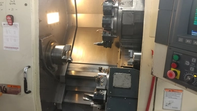USED 1998 OKUMA IMPACT