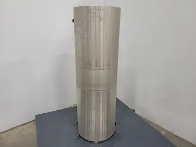 Quantum Mechanical Axial Magnetic Shield