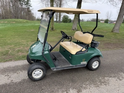 (1) 2015 E-Z-Go golf cart with a Kawasaki gas engine, does not include Club canopy, includes ball wa...