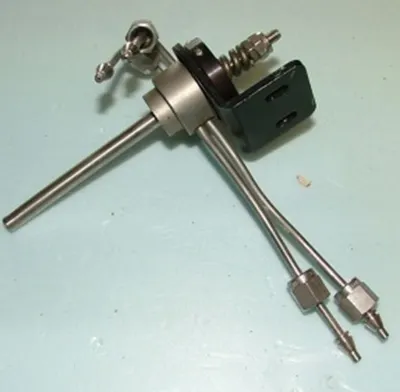 QTY. 1. VICI VALVE 4 PORT WITH FITTINGS AND BRACKE...
