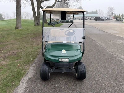 (1) 2015 E-Z-Go golf cart with a Kawasaki gas engine, does not include Club canopy, includes ball wa...