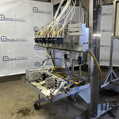 6 Head ELF Filler with feed tanks & container link belt conveyor