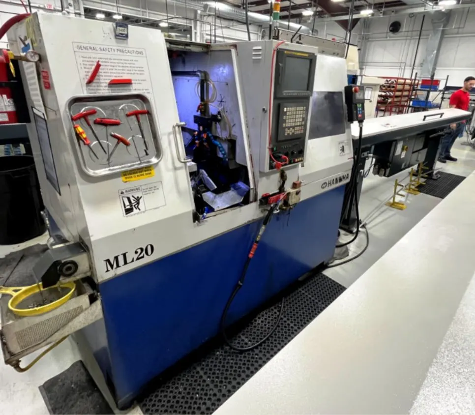 Hanwha ML20 CNC Swiss Screw
Machine, New 2000.