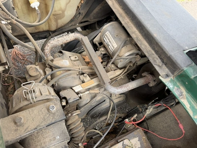 (1) 2015 E-Z-Go golf cart with a Kawasaki gas engine, does not include Club canopy, includes ball wa...