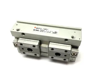 USED SMC LOW-PROFILE PNEUMATIC GRIPPER, 2-FINGER, 16MM STROKE PER JAW