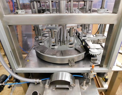 USED JG VACUUM FILLER 12 STATION