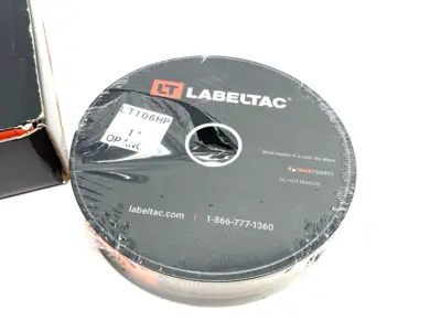 USED LABELTAC PRO MODEL HIGH PERF. 10 YEAR VINYL LABEL 1" X 150' ROLL ORANGE