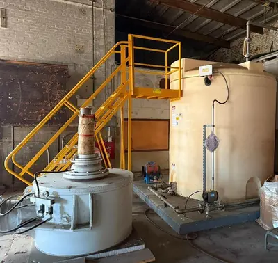 2,500 GALLON PLASTIC TANK WITH STEEL STAIRWAY
