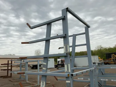 Metal 8-Tier Cantilever Rack, welded together, arms stick out approx. 20” and have metal brackets th...
