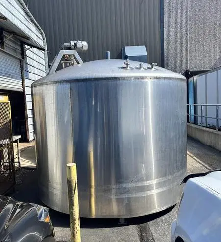 Used approximately 2400 gallon vertical stainless steel sanitary mix tank