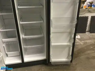 USED FRIGIDAIRE STAINLESS STEEL AND BLACK SIDE BY  SIDE REFRIDGERATOR HIGH EFFICANCY ENERGY STAR