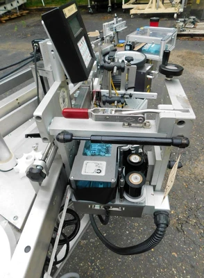 USED NEWMAN WRAP AROUND LABELER NV II