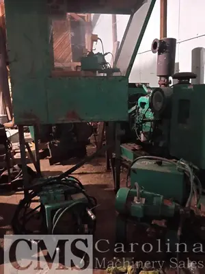 USED HELLE 3-HEAD BLOCK SAWMILL WITH VERTICAL EDGER