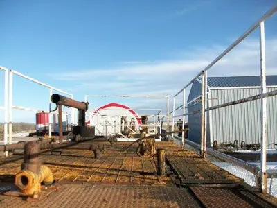 USED 24 M3 (150 BBL) SKID MOUNTED 2 COMPARTMENT MUD TANK