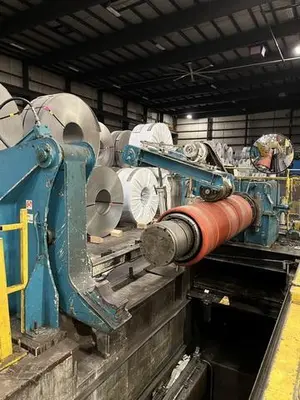 72" x 60,000lbs Denro Uncoiler with Hold Down Roll and Mandrel Support Arm