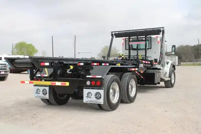New | in-Stock 2027 PETERBILT 548 Rolloff Trucks Texas US | Roll Off Truck World #1492003