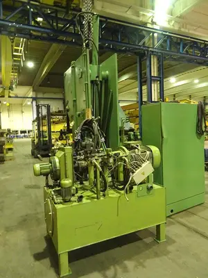 USED HAEUSLER FLANGING MACHINE