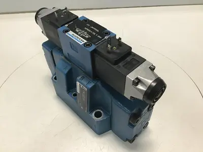 USED REXROTH 4WE6J53/AG24N24 & MANIFOLD