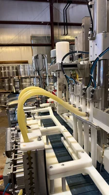 Wild Goose 4 head filler and seamer with depalletizer