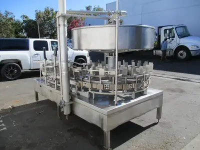 Gravity feed, 1 gallon bottle filling machine w/ 24 heads