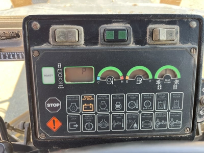 USED 2004 JOHN DEERE 670C SERIES 2