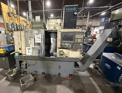 2012 OKUMA GENOS L400E CNC Lathes | Olympia Technical Services (1)