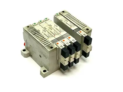 VV5Q21-05N9FU0-S,VQ2200N-5 | SMC VV5Q21-05N9FU0-S Manifold Base w/ Solenoids - For parts or not working