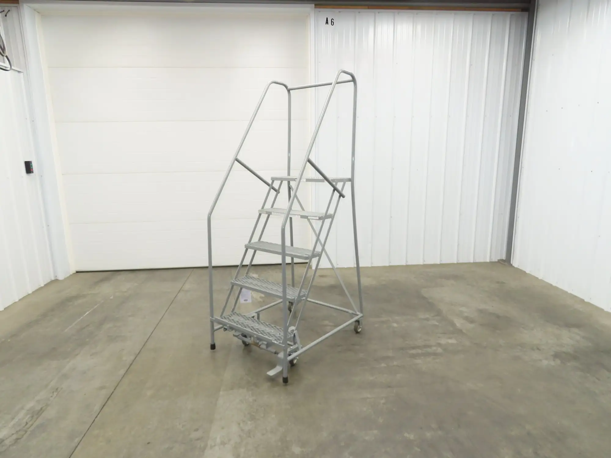 Uline H-84-110 Rolling Ladder 5 Step 10" Work Platform 50" Top Step 450lbs