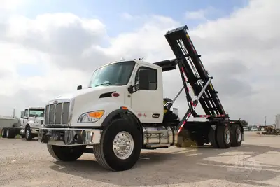 New | in-Stock 2027 PETERBILT 548 Rolloff Trucks Texas US | Roll Off Truck World #1492003