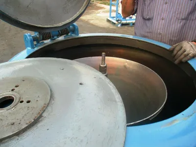 Barrett 1101-E spindle post type chip spinner with hoist.
