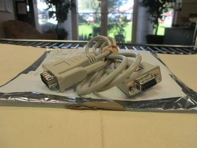 Used RS-232 Beige 9-pin Male to 9-pin Female PC Cable (Approx. 3 feet)