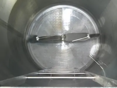SPC9203  Tank 1900 gallon vertical tank, Stainless Steel, bottom & 1/3 up the side jacket, 3 hp bottom mounted agitator, dish