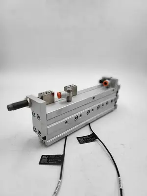 USED SMC SMC MXS16-100 PNEUMATIC SLIDE TABLE - STROKE 100MM