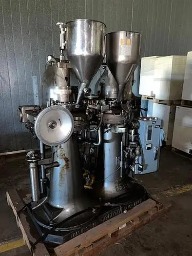 Manesty model Drycota 23 station consisting of (2) presses with transfer system