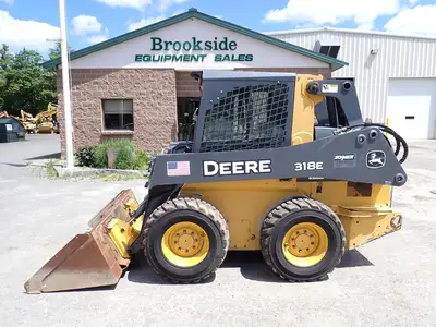 Used 2015 DEERE 318E Skid Steer Loaders Massachusetts US | Brookside Equipment Sales #1422198