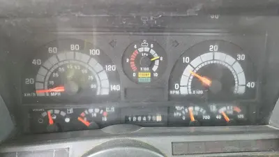 USED 2000 GMC C8500 TANDEM AXLE BED TRUCK