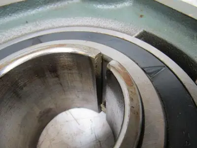 NTN F315 4-Bolt Flange Brg. Housing W/UK315+HE2315 2-1/2 ADAPTER SLEEVE BRG.