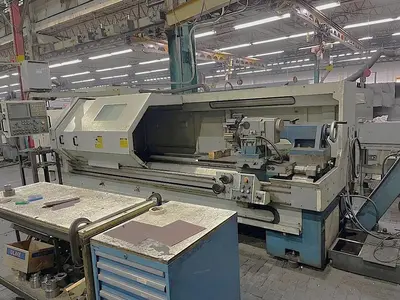 USED 2002 ROMI M27 X 120"