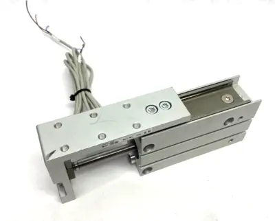 USED SMC COMPACT SLIDE TABLE CYLINDER W/ DUAL AUTO SWITCHES