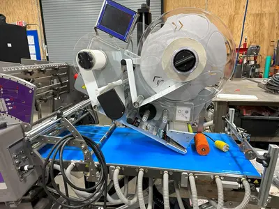 USED MFT 550 IP³ FEEDER AND LABELING SYSTEM