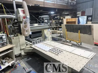 USED 2002 MOTIONMASTER QE1F 6.6/12 24 130 NC CB 5-AXIS CNC ROUTER