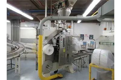 Young & Co. stand up filter pouch filler with inline feeder