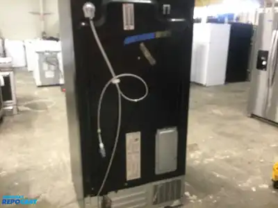 USED GE STAINLESS STEEL AND BLACK SIDE X SIDE REFRIGERATOR HEAVY DUTY ENERGY STAR