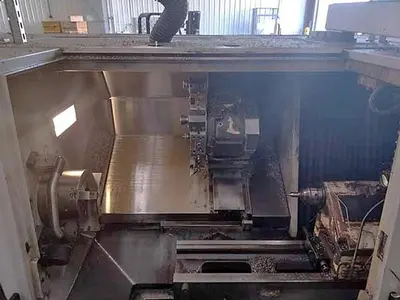 USED 2012 OKUMA GENOS L400-E