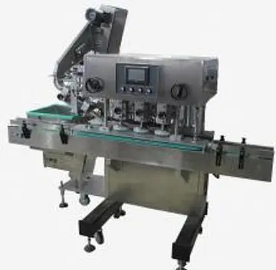 XG 120 6 quill capper with Waterfall Feeder