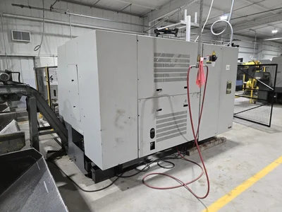 Hyundai SKT-300 CNC Lathe w/ Tailstock and Indexer, 10 Slot Turret, LNS Conveyor, 3-Jaw Chuck, Fanuc