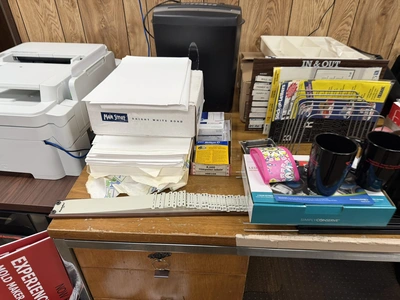 (1) 80" wooden desk with contents, includes paper shredder, paper organizers, Rolodex cards, coffee ...