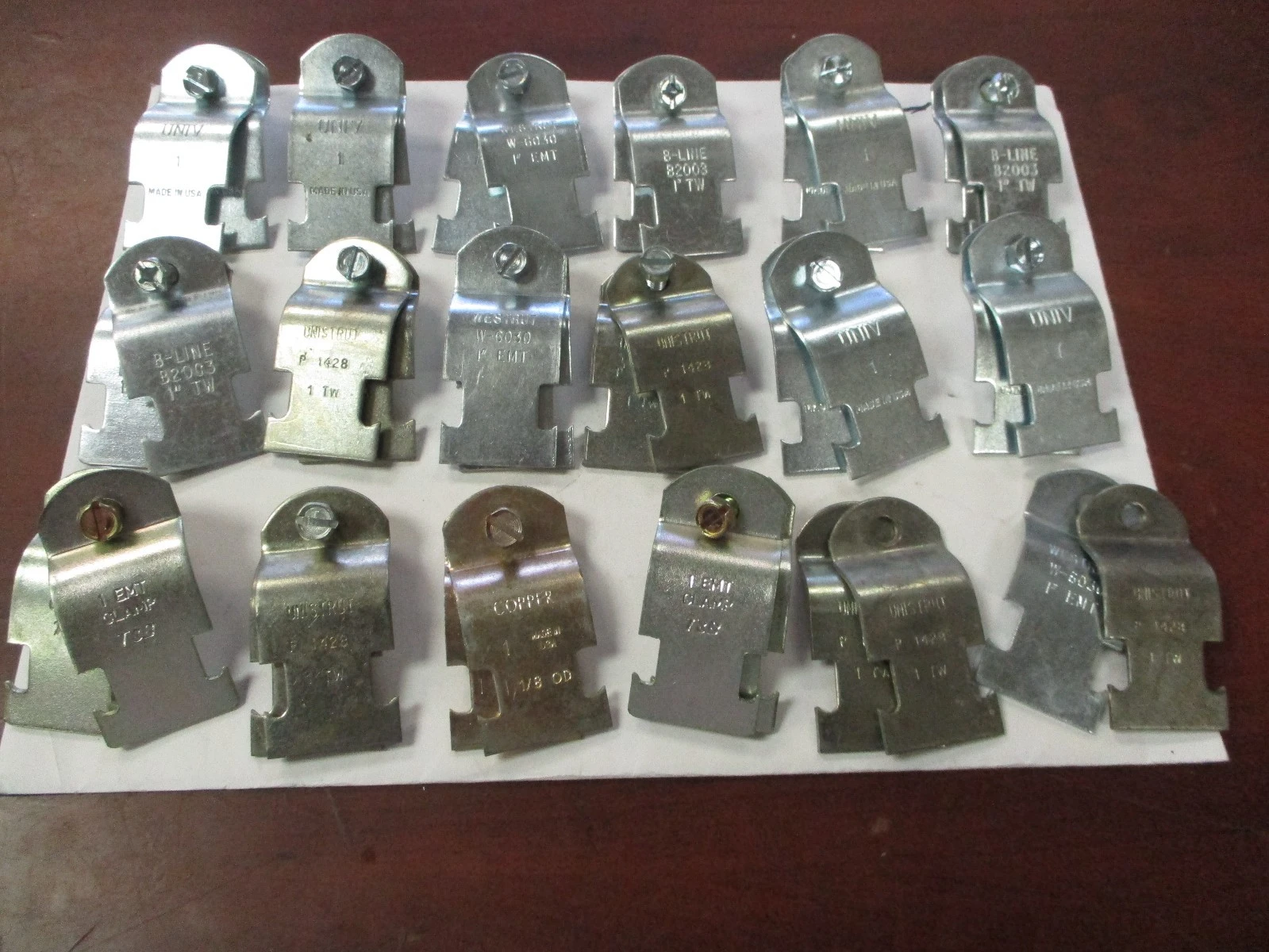 Unused 1" EMT Rigid Pipe Clamps (QTY 36)